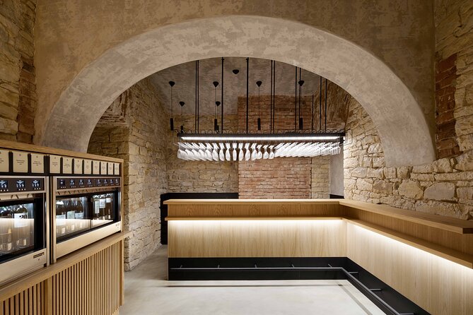 2 Hours Wine Tasting in a Historical Cellar in Krizikova - Entering a historic cellar, but with modern wine machines