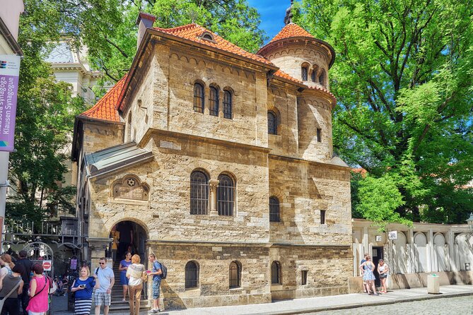 Best of Prague: Private City Walking Tour, Boat Cruise, and Typical Czech Lunch - Vltava River cruise from the wooden boat, with seasonal drinks