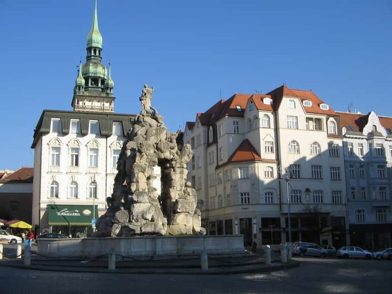 Brno: Historic Downtown Walking Tour - Old Town Hall legend, dragon and wheel