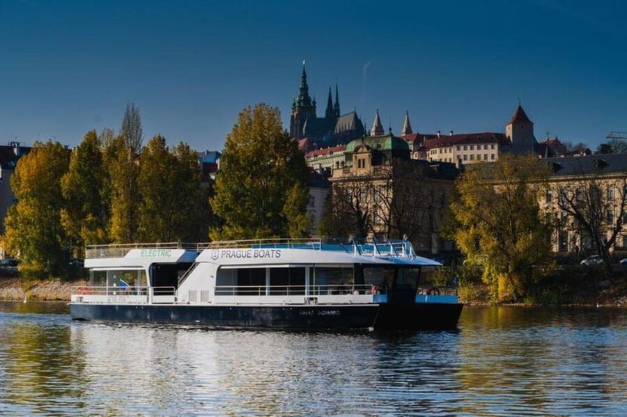 City Sightseeing Prague HOHO Bus, Castle Tour + River Cruise - Red Line stops: main station to castle views, with a wheelchair option