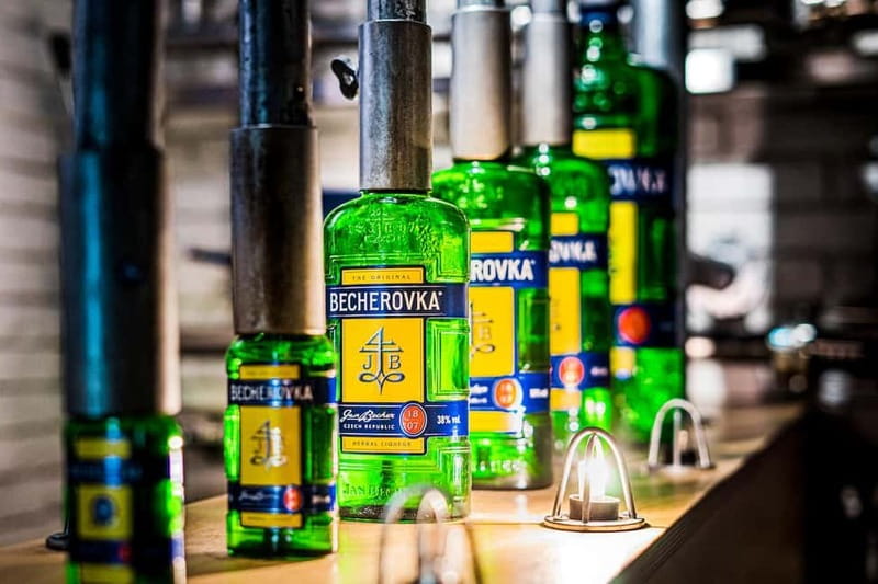Karlovy Vary: Home of Becherovka Visitor Center Guided Tour - The guided exhibition and historical bottles: where the senses come in