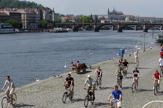 Prague Bike Tour - Midway Vltava River Stop for a Drink You Pay For