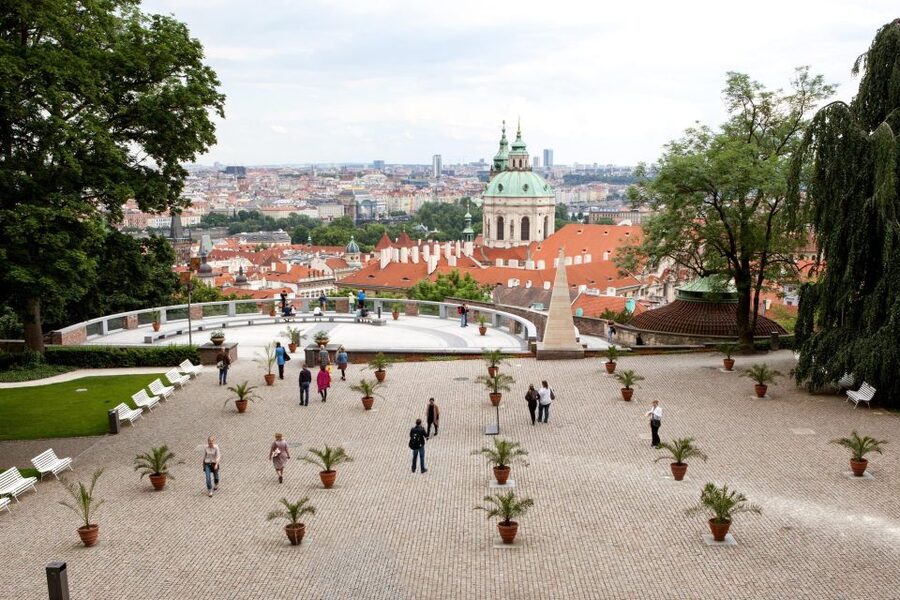 Prague City Tour with Vltava River Cruise - Riding past Prague icons: National Theatre, Rudolfinum, and the synagogues