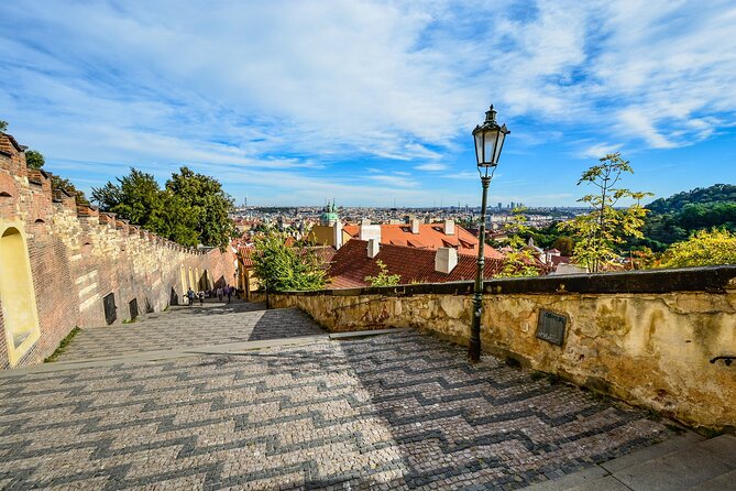Prague DeLuxe Tour: Views, Hidden Gems, Tastings & River Cruise - Tram ride to Hellichova 3: local transit and viewpoint refreshers