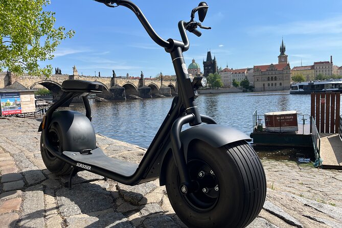 Prague Fat Tire E-Scooter Tour with A Local Guide - Entering Prague on Fat Tires: Grandior, helmets, and your first minutes