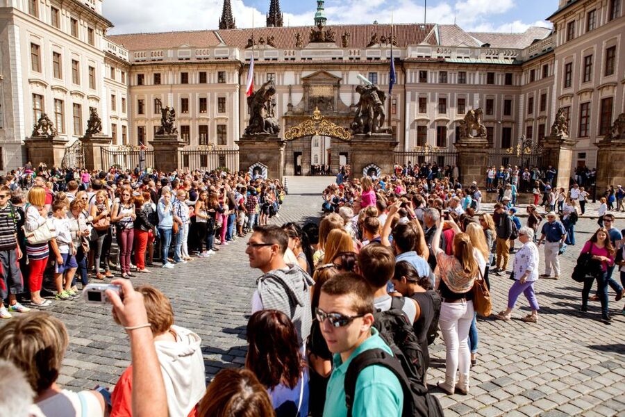 Prague: Full-Day Sightseeing Tour with Cruise and Lunch - Crossing toward Castle Town: views start before you reach the gates