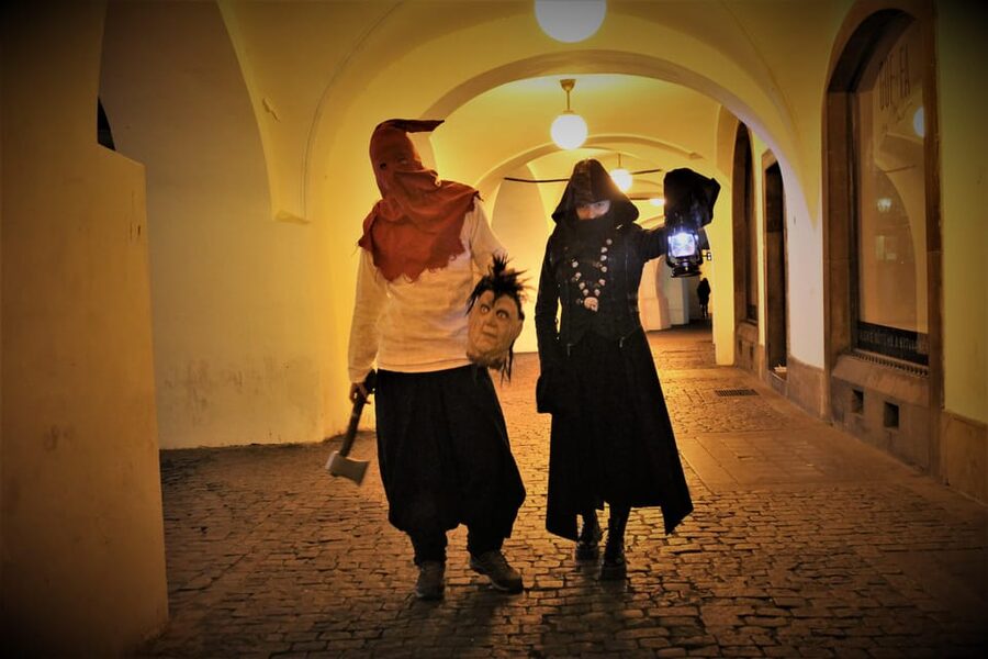 Prague: Ghosts, Legends, Medieval Underground & Dungeon Tour - Meeting in Old Town, Then Learning Prague in Short, Punchy Street Stops