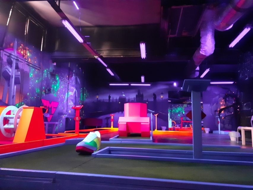 Prague: Glow Golf Mini Golf Game by UV Light - Czech-themed murals, décor, and the neon photo factor