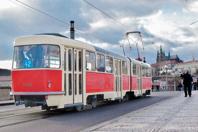 Prague Hop on Hop off Sightseeing Tram - Which tram experience you should expect: helpful staff, self-guided audio, and real-world timing