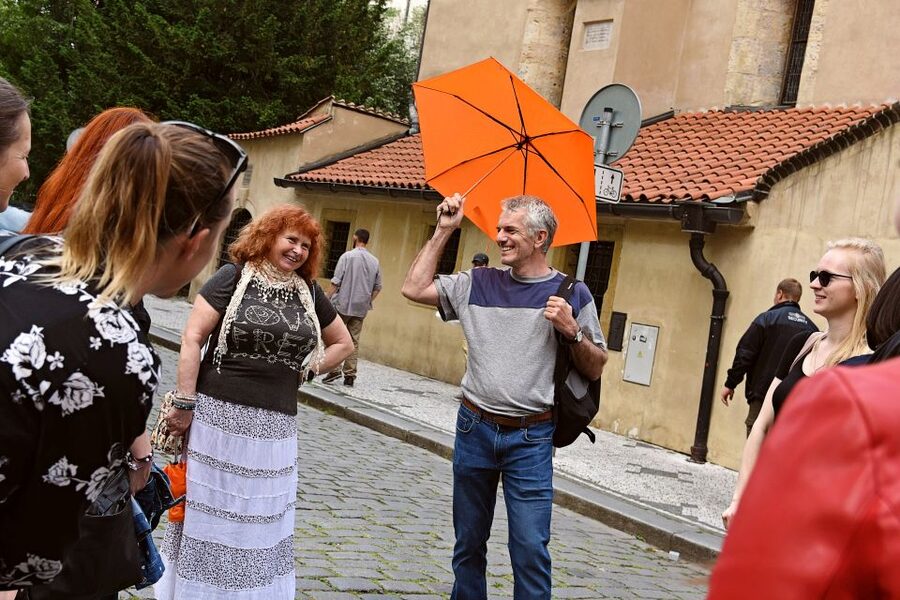 Prague: Old Town and Jewish Quarter Tour - Starting at Křižovnické náměstí, find the King Charles IV statue and orange umbrella