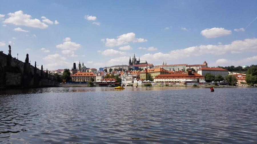 Prague: Old Town Guided Walking Tour and City Boat Ride - Charles Bridge to the Boat: Expect a Transition Moment