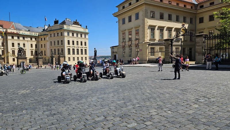 Prague: Panoramic Viewpoints Guided Electric Tricycle Tour - Prague Castle Square stop for main-gate photos and classic framing