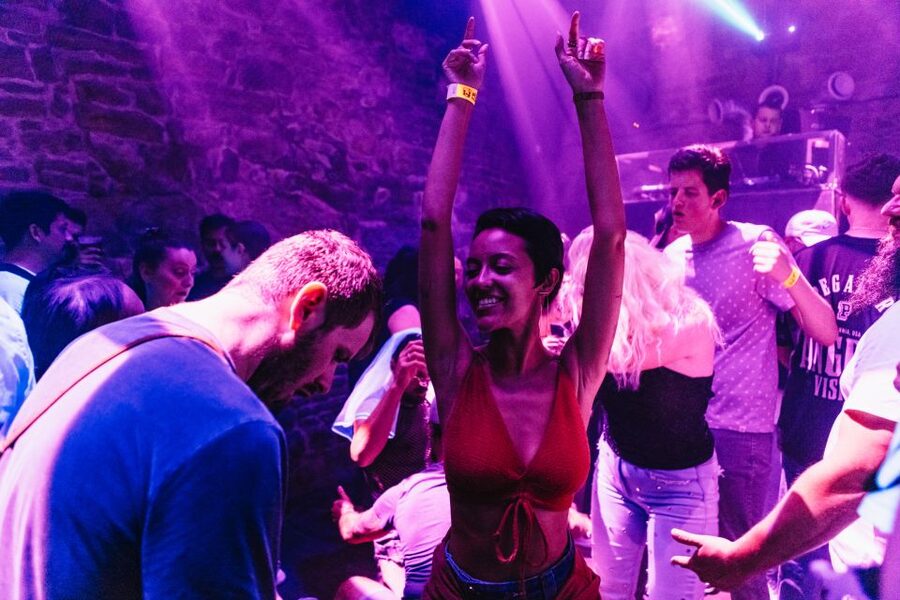 Prague: Pub Crawl with Unlimited Drinks & 5-floor Club Entry - The middle stops: 3 to 4 bars where the welcome shot keeps you moving