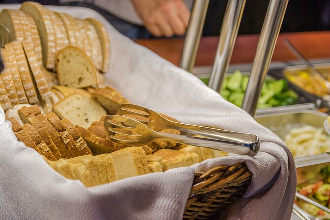 Prague: Sightseeing Boat Cruise with Buffet Dinner - Buffet dinner and the welcome drink: what is included, what is not