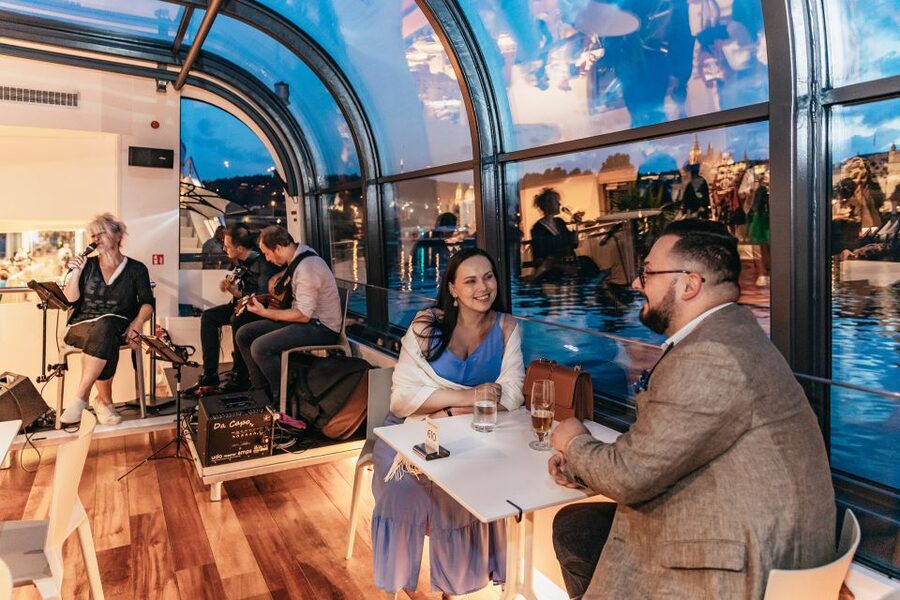 Prague: Sightseeing Dinner Cruise on Open-Top Glass Boat - The 3-hour route: from Prague Castle lights to the Charles Bridge glow