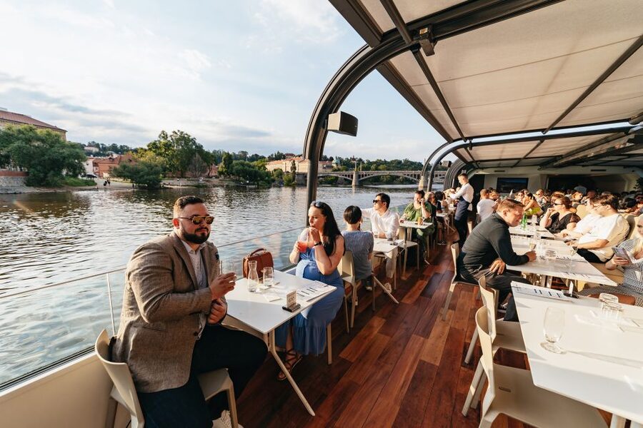 Prague: Sightseeing Dinner Cruise on Open-Top Glass Boat - Live music and onboard atmosphere that actually feels like an evening