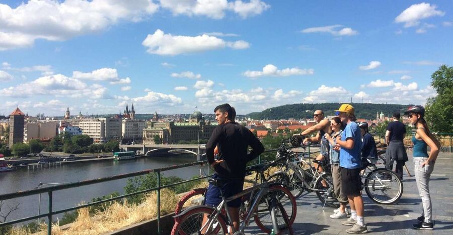 Prague: Stunning Viewpoints, Castle, City & Park Bike Tour - Starting at Praha Bike, then rolling toward the Vltava River views