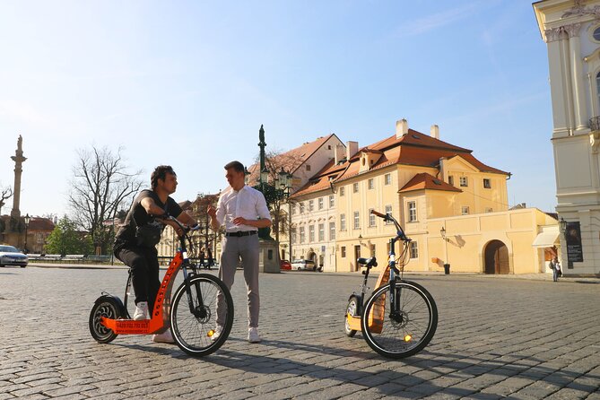 Prague Trike & e-Scooter Tour: Castle Viewpoints & Charles Bridge - Metronome to Strahov, From Old Monuments to Monastery Stops