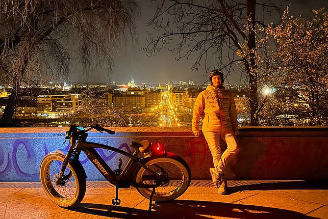 Retro Style E-Bike Night Tour in Prague - Live Guided - Lennon Wall, Franz Kafka Outside Stops, and the Feeling of Prague as a Street Story
