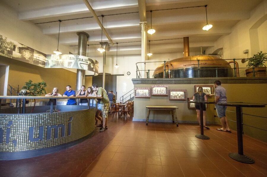 Velke Popovice: Kozel Brewery Tour with Beer Tasting - Where Beer Becomes Product: Bottling, Kegs, and Packaging Display